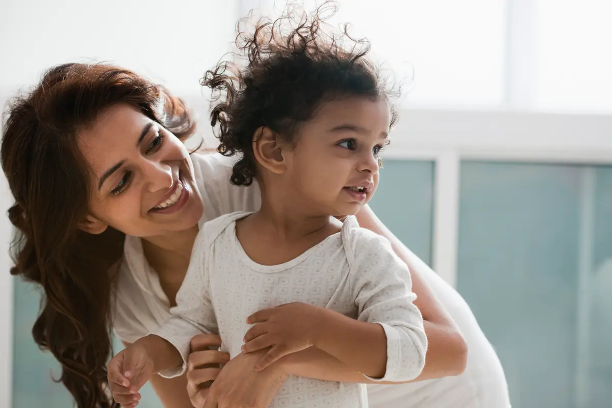 Infant responding to his name being called : Communication and language development milestones