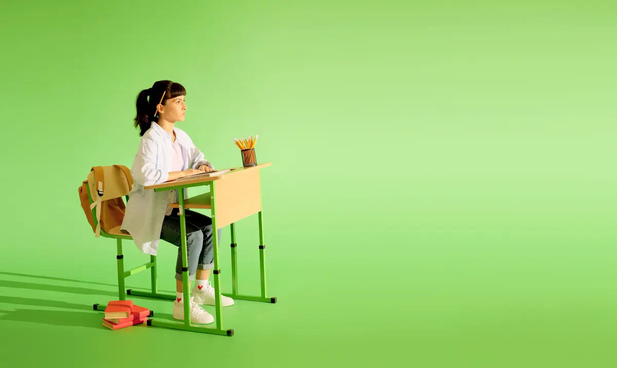 Child sitting post sensory processing disorders classroom strategies